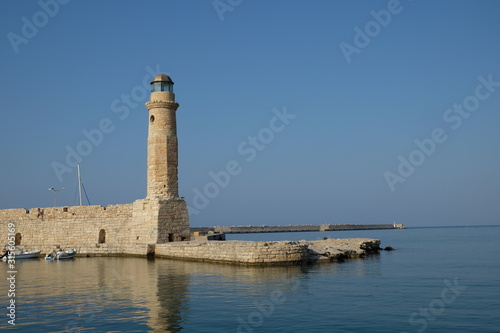 Old lighthouse near the harbor of Rethymno, Crete, Greece.