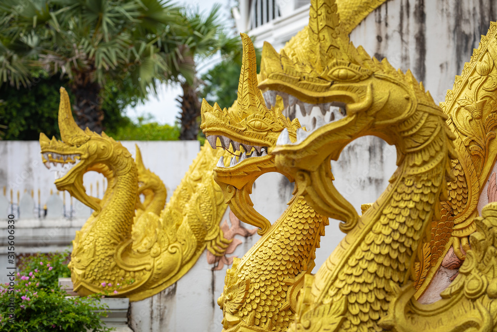 Fototapeta premium Dragons statues at Haw Phra Kaew, also written as Ho Prakeo, Hor Pha Keo, Vientiane, Laos.