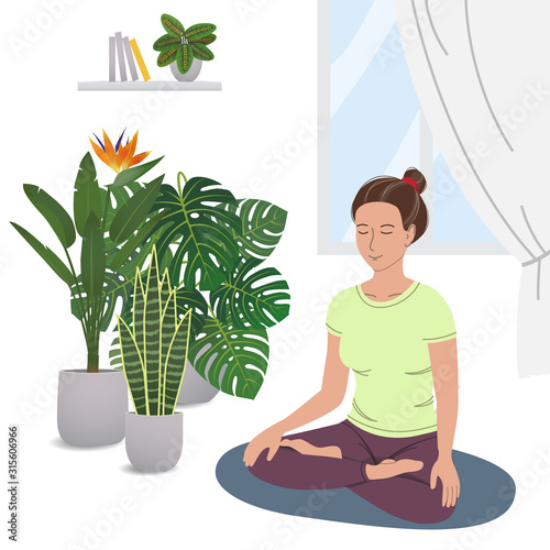 Smiling girl practicing yoga and enjoying meditation.