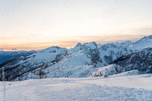 Spectacular winter mountain panoramic view of mountains at sunset. © anzebizjan