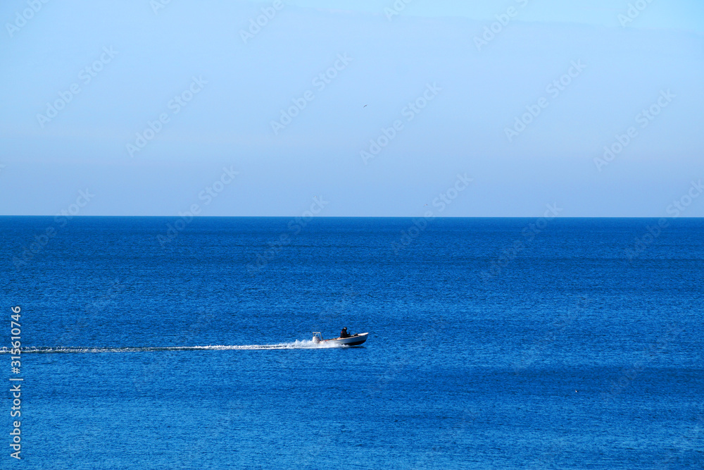 boat rushing through the sea