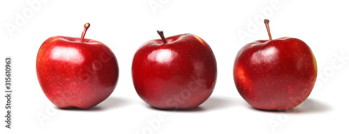 Fresh red ripe apples isolated on white background.
