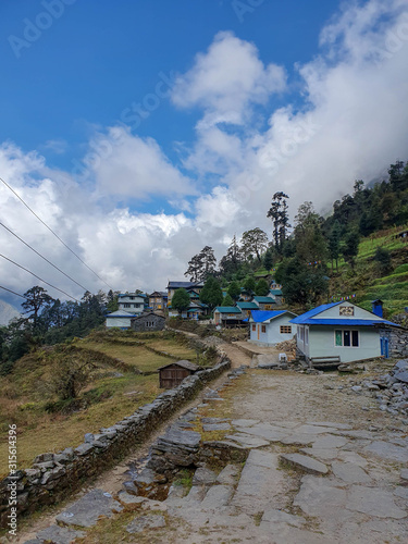 NEPAL, November 2019: Everest base camp trek itinerary: way from Bupsa to Phakding. Lodges in Paiya village. Solokhumbu area, Nepal. photo