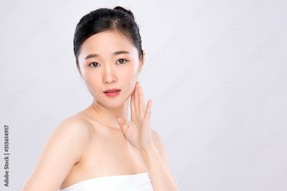 Portrait beautiful young asian woman clean fresh bare skin concept. Asian girl beauty face skincare and health wellness, Facial treatment, Perfect skin, Natural make up, on white background Portrait beautiful young asian woman clean fresh bare skin concept. Asian girl beauty face skincare and health wellness, Facial treatment, Perfect skin, Natural make up, on white background