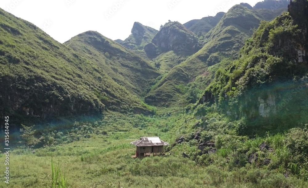 A single traditional vietnamese farmer hut in the mountains