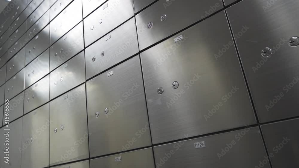 Moving shot Metal safe box panel wall. Concept for security and banking protection.