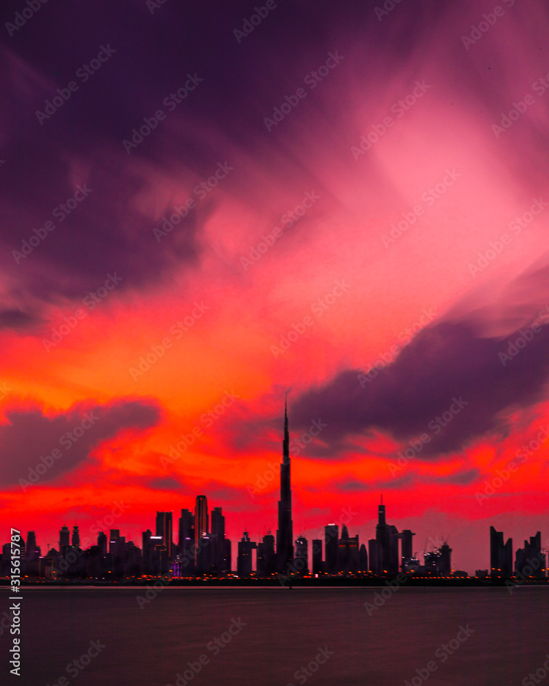 Red Sunset at Dubai, Moody Weather with great clouds formation