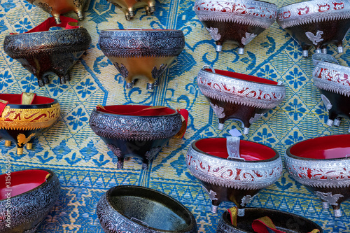  Souvenir market at Luang Prabang in Laos. Homemade artworks by local people. © Curioso.Photography