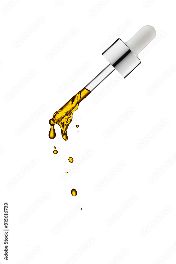 Cosmetic pipette with drops.