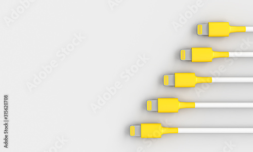 yellow and white USB connection cable on gray background.