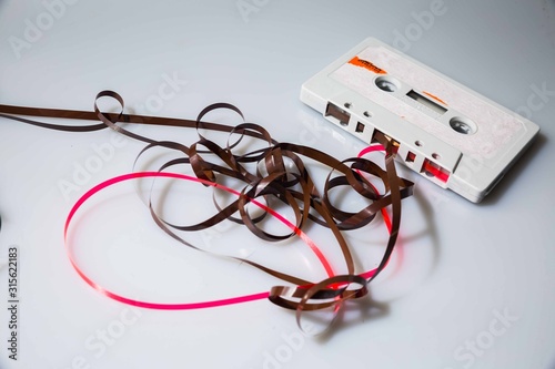 Obraz na plátně Leeds, UK, 03/02/19Cassette unspooled with loose tape tangled up around itself s