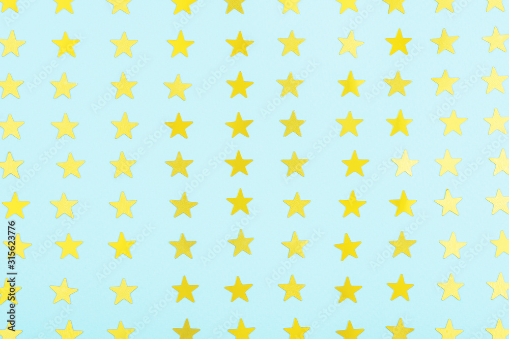 pattern of gold stars on blue background