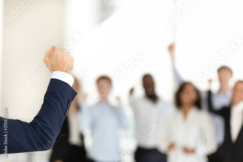 Successful team leader make speech unifying excited colleagues