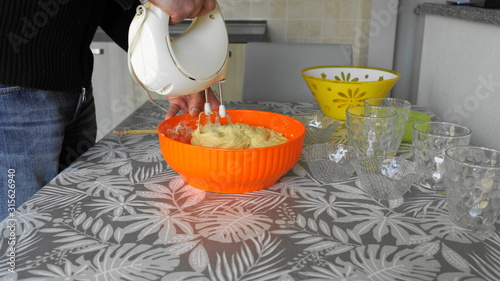 Canvas Print knead a cake with a whisk