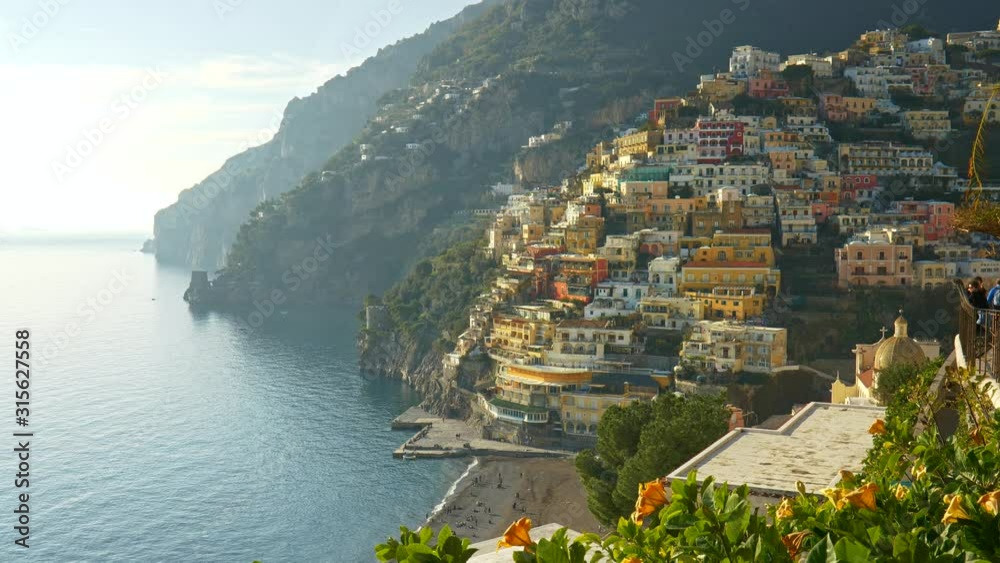 Positano, Amalfi, Italy. Gimbal shot of Positano village at sunset. 4K