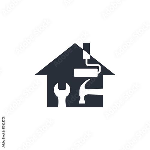 Construction tools on a background of the house. Vector icon isolated on white background.