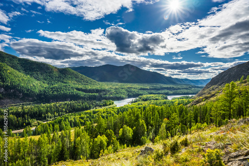 Yenisei river in Sayan mountains in sunny day. Siberia, Russia.