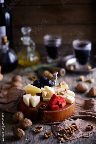cheese on the cutting board. selective focus © zoryanchik