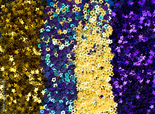 Top view of different colored glitter as a background