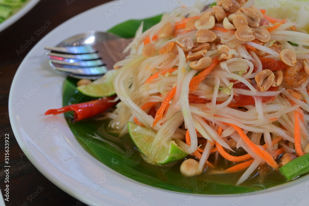Thai food, spicy papaya salad Thai food, spicy papaya salad