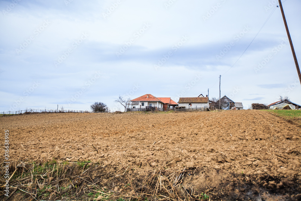 Fototapeta premium Rural agricultural landscape of the ploughed field