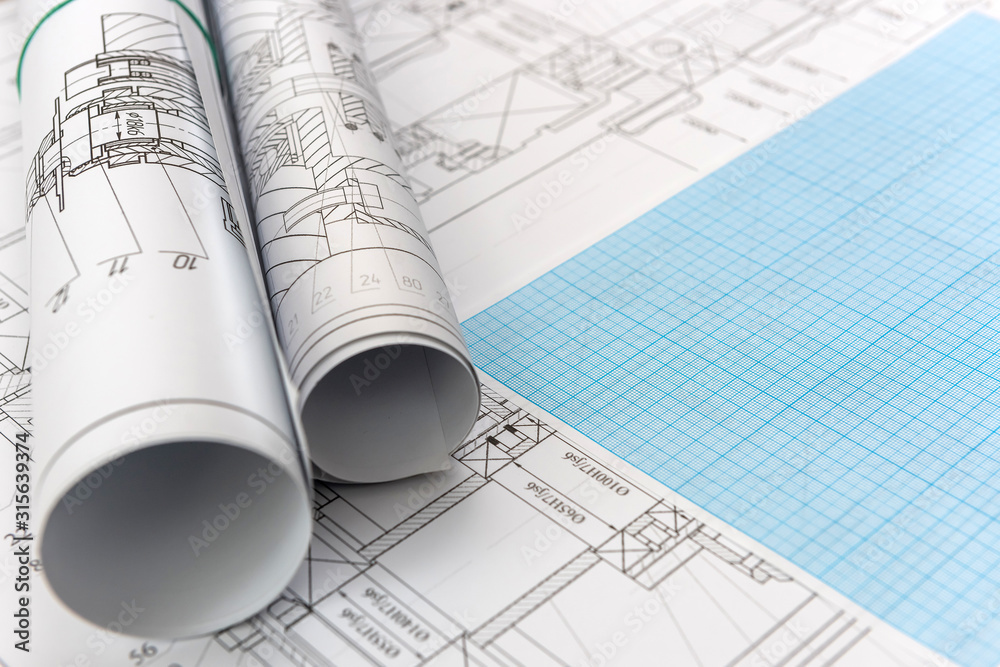 Technical drawing with millimeter paper and drawing tools. Mathematics