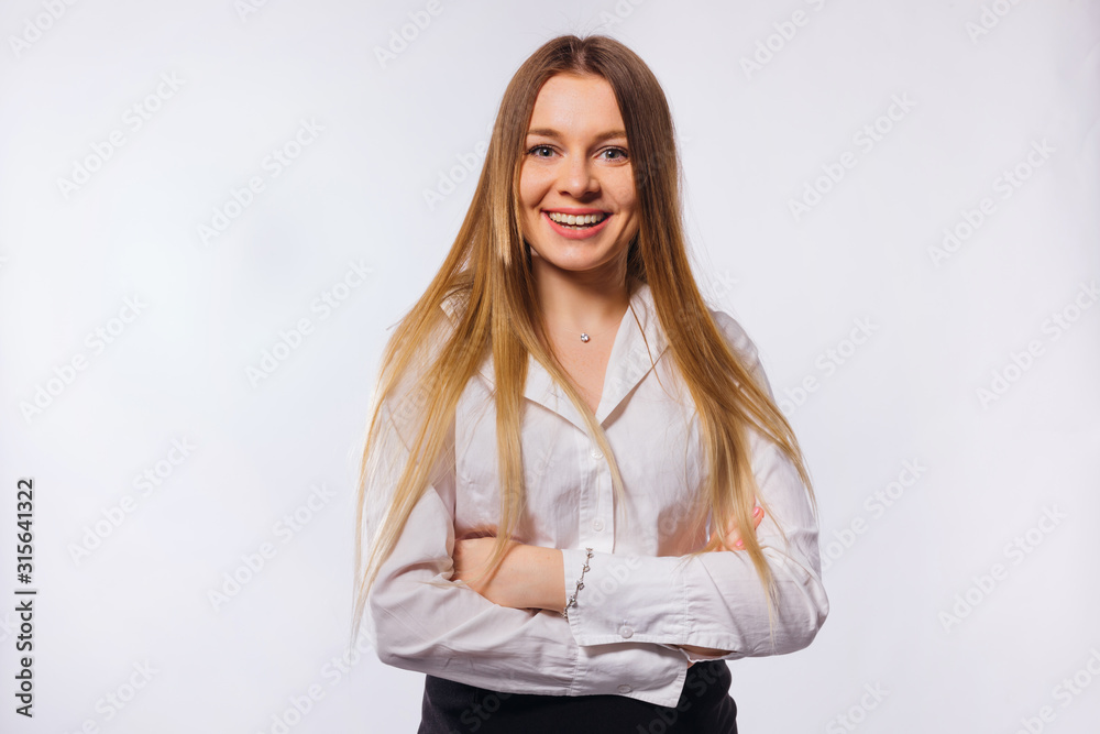girl smiles and crossed arms against. woman wearing formal white girl smiles and crossed arms against. woman wearing formal white
