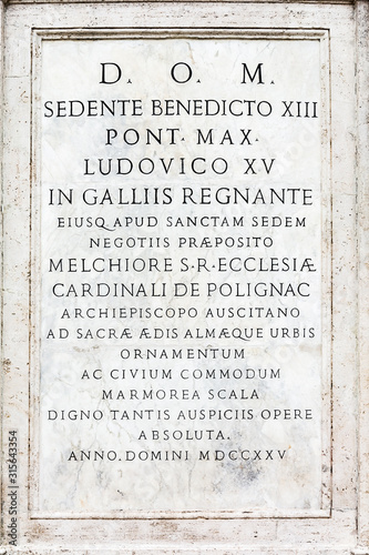 Memorial inscription on the wall of the Spanish Steps in Rome photo