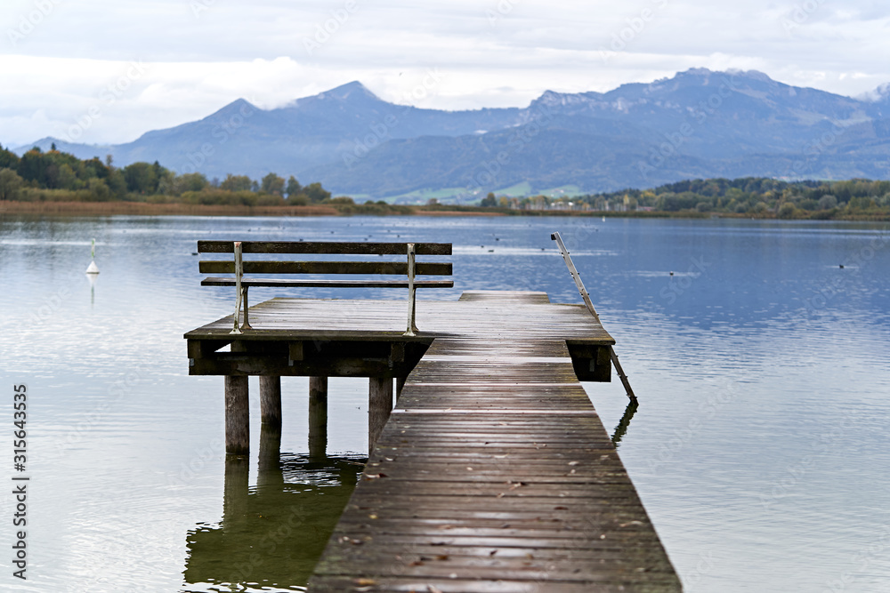 Jetty with a bench in a lake