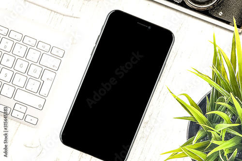 iPhone X on desk top view