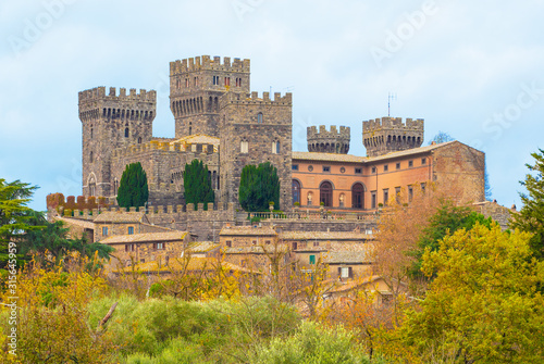 Torre Alfina (Lazio, Italy) - The sacred and magical wood called 'Bosco del Sasseto' during the autumn with foliage, beside the medieval village with castle photo