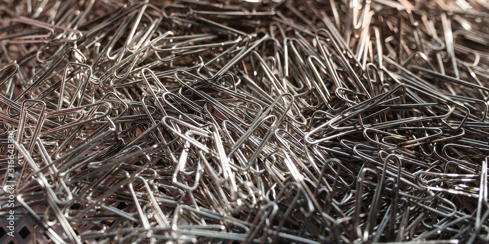 Group, collection of metal paper clips. 