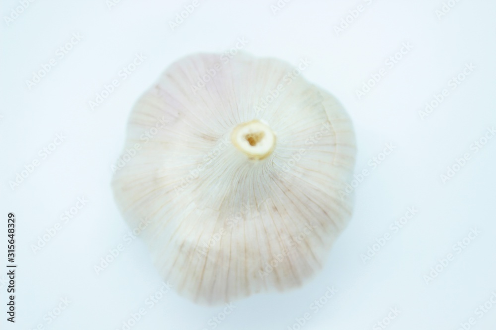 Head of garlic located on a white background Head of garlic located on a white background