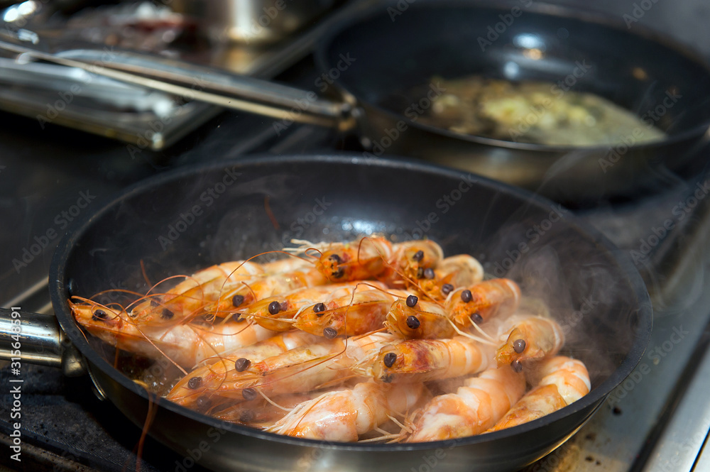 cooking shrimp cocktail with sauce in a restaurant, ready meal cooking shrimp cocktail with sauce in a restaurant, ready meal
