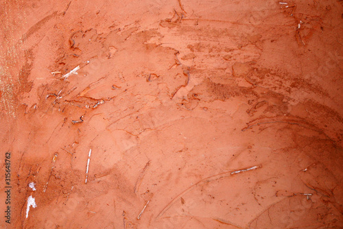 brown sand stone wall background, cement wall , dirty concrete floor, clay