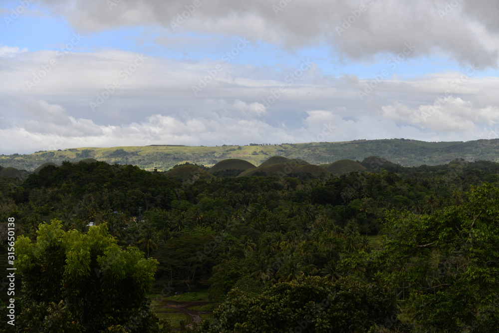 view of the chocolate hills on bohol island in the philippines