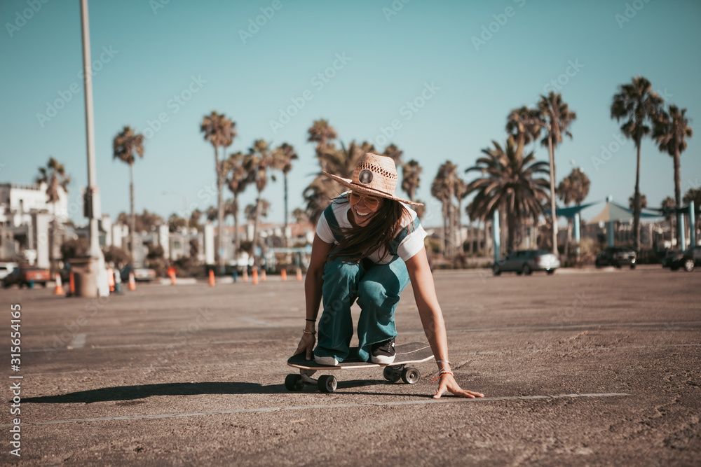 Fototapeta premium profi skater on a parking spot at santa monica. california