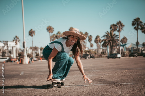 profi skater on a parking spot at santa monica. california photo