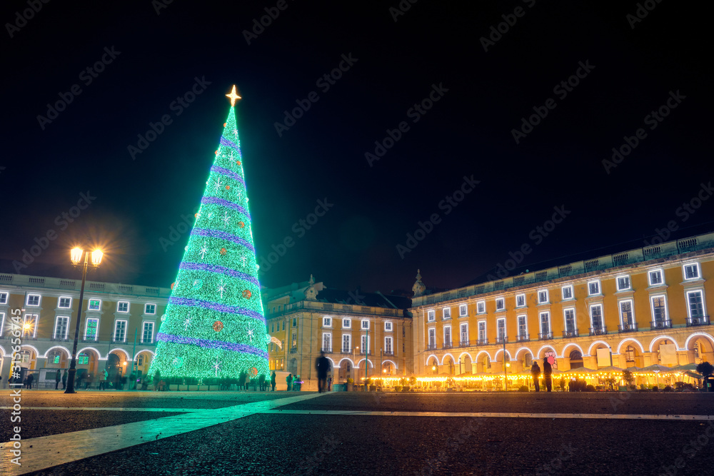 Christmas tree at Commerce Square at night in Lisbon.