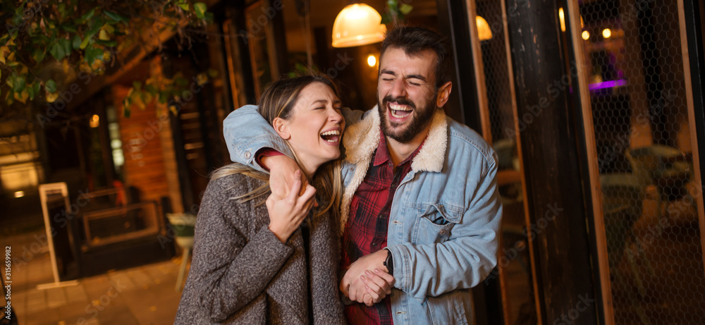 Young couple in city is having fun