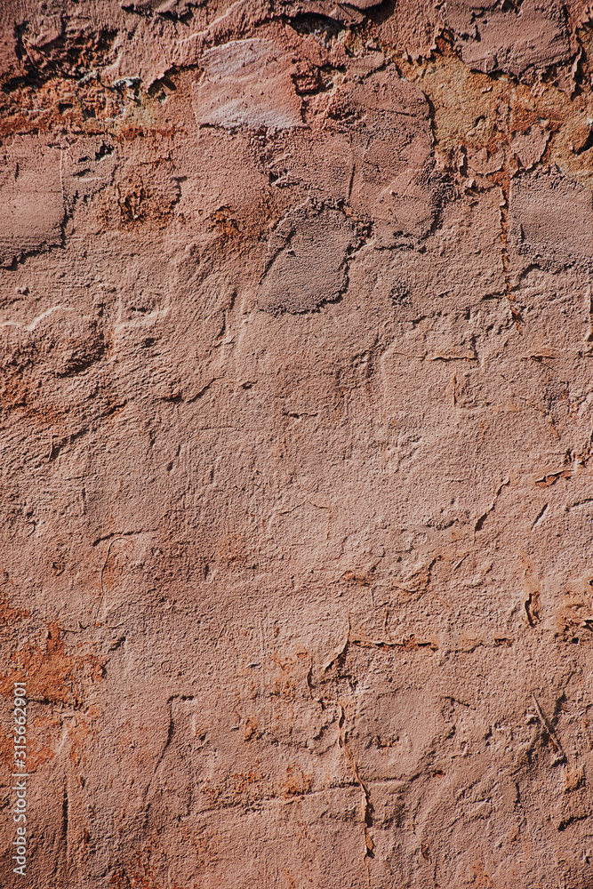 Fototapeta premium Vertical shabby old red wall texture