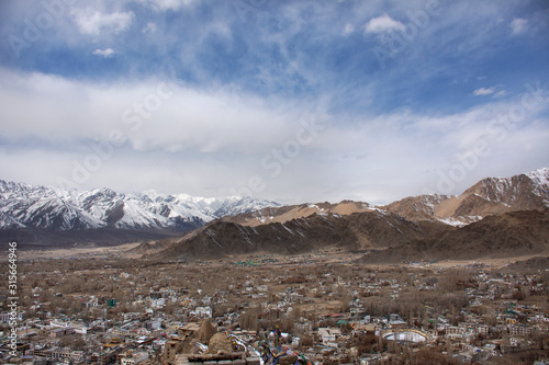 View landscape and cityscape of Leh Ladakh Village with high mountain range from viewpoint Tsemo Maitreya Temple or Namgyal Tsemo Monastery while winter season in Jammu and Kashmir, India