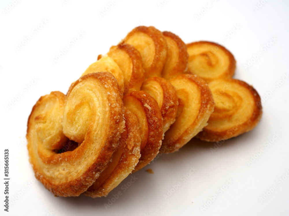 Palmeras de hojaldre. Concepto de pastelería casera. Palmeras de hojaldre. Concepto de pastelería casera.