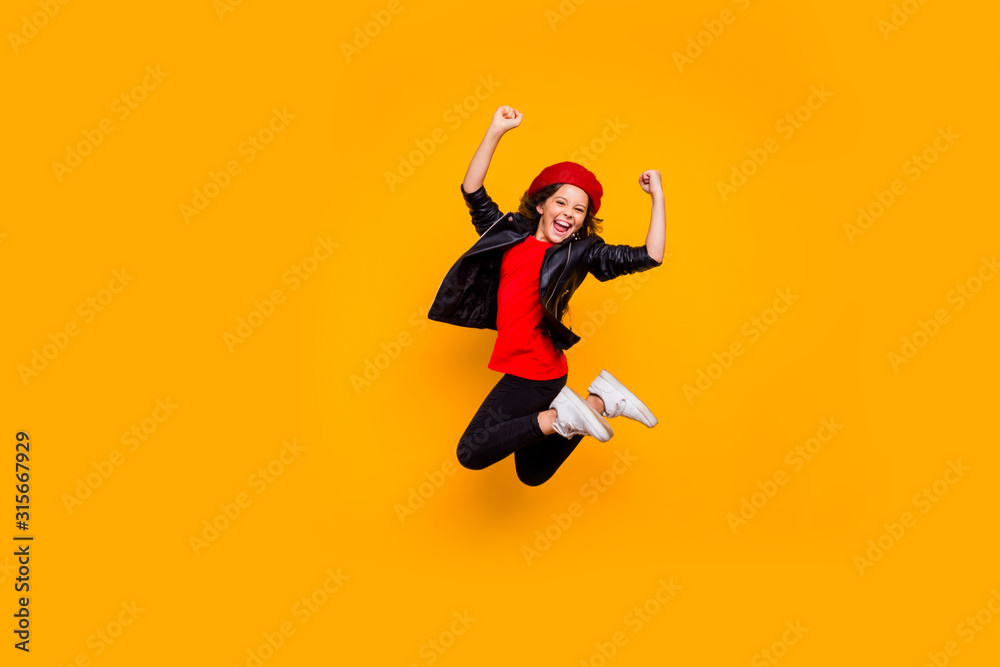 Full length body size view of her she nice attractive cheerful overjoyed brunette wavy-haired girl jumping having fun vacation weekend isolated on bright vivid shine vibrant yellow color background