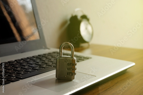 Code-locked padlock on the laptop computer. internet security and Computer security Concept