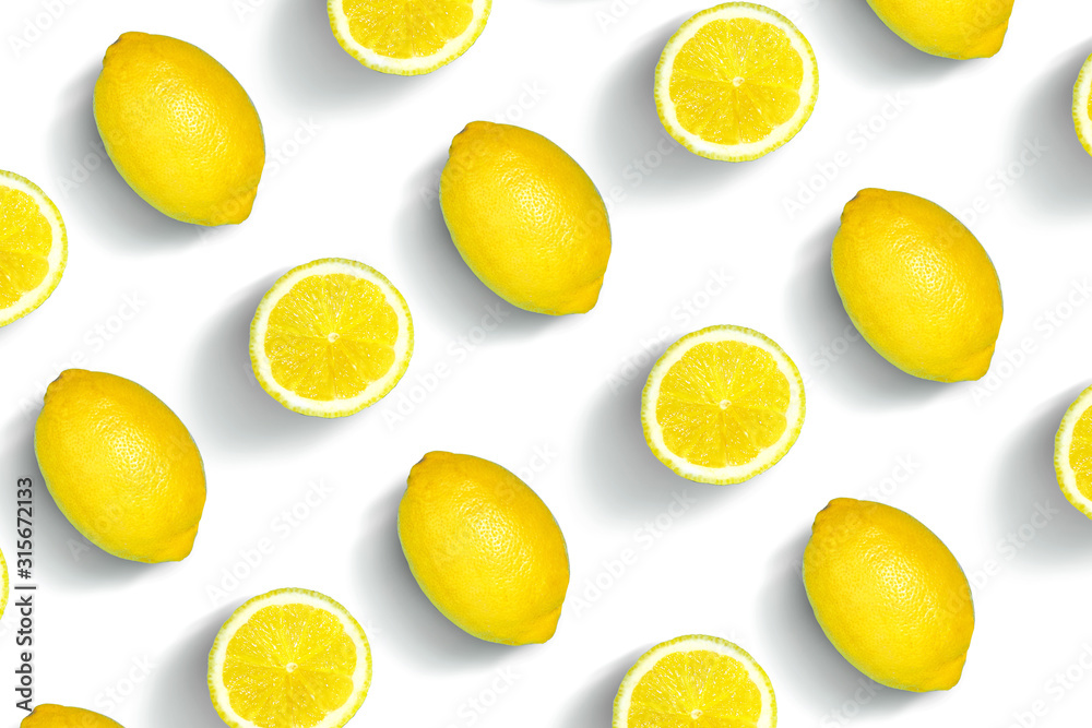 Colorful  pattern of fresh lemon slices on a white background. Lemon slices isolated, top view.
