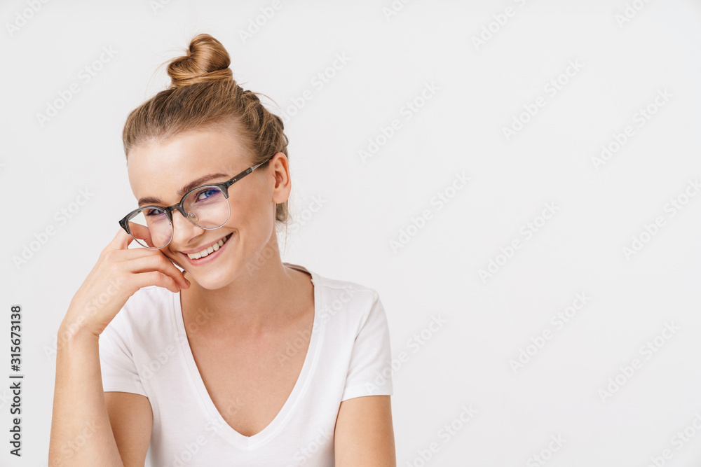 Photo of beautiful happy woman smiling and looking at camera