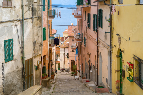 Typical old town narrow street. Porto Santo Stefano, Toscana, Italy © AlexanderNikiforov