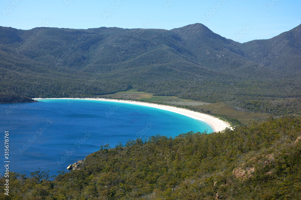 View over turquoise waters of Wineglass Bay, Freycinet National Park, Tasmania, Australia