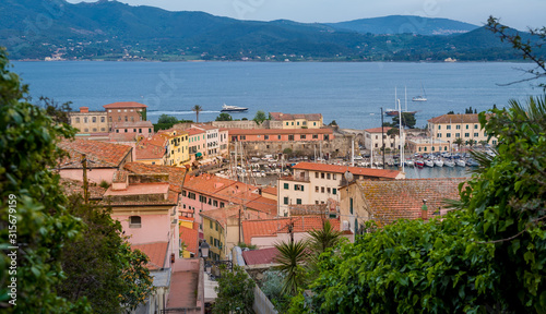 Sailing boats at Elba island embankment, fortress viewpoint, Italy